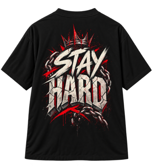 20260925110715-1f1b8d14-434b-691e-9d14-ae012baf0a2e.png Black streetwear T-shirt featuring a graphic print of a crown, chains, and the text STAY HARD in a distressed, bold, stone-like font style.