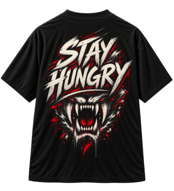 Black VX MERCH T-shirt featuring a graphic of a snarling beast with red eyes and the text STAY HUNGRY in a bold, distressed white font.