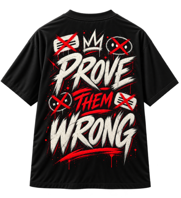 Black graphic T-shirt featuring white and red graffiti-style text that reads Prove Them Wrong with a crown icon and crossed-out speech bubbles.