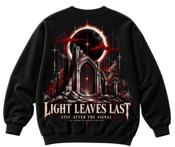 20261001104238-1f1bd84d-2265-6b44-9911-e2416409f8fa.png Black VX MERCH sweatshirt featuring a gothic archway, red eclipse, and text reading Light Leaves Last, Stay After The Signal, VX Merch Worldwide.