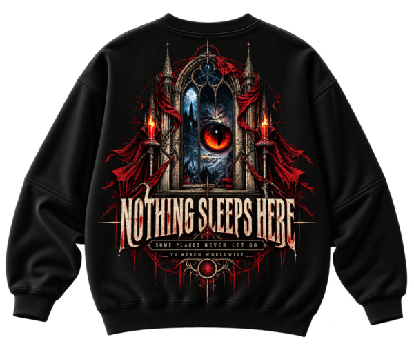 Black VX MERCH sweatshirt featuring a gothic window graphic with a glowing eye, red drapes, and the text Nothing Sleeps Here in a distressed font.