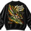 Focus Becomes Flight oversized black graphic sweatshirt featuring a diving falcon with green, orange and golden feathers, dynamic motion lines and wildlife-inspired back print.